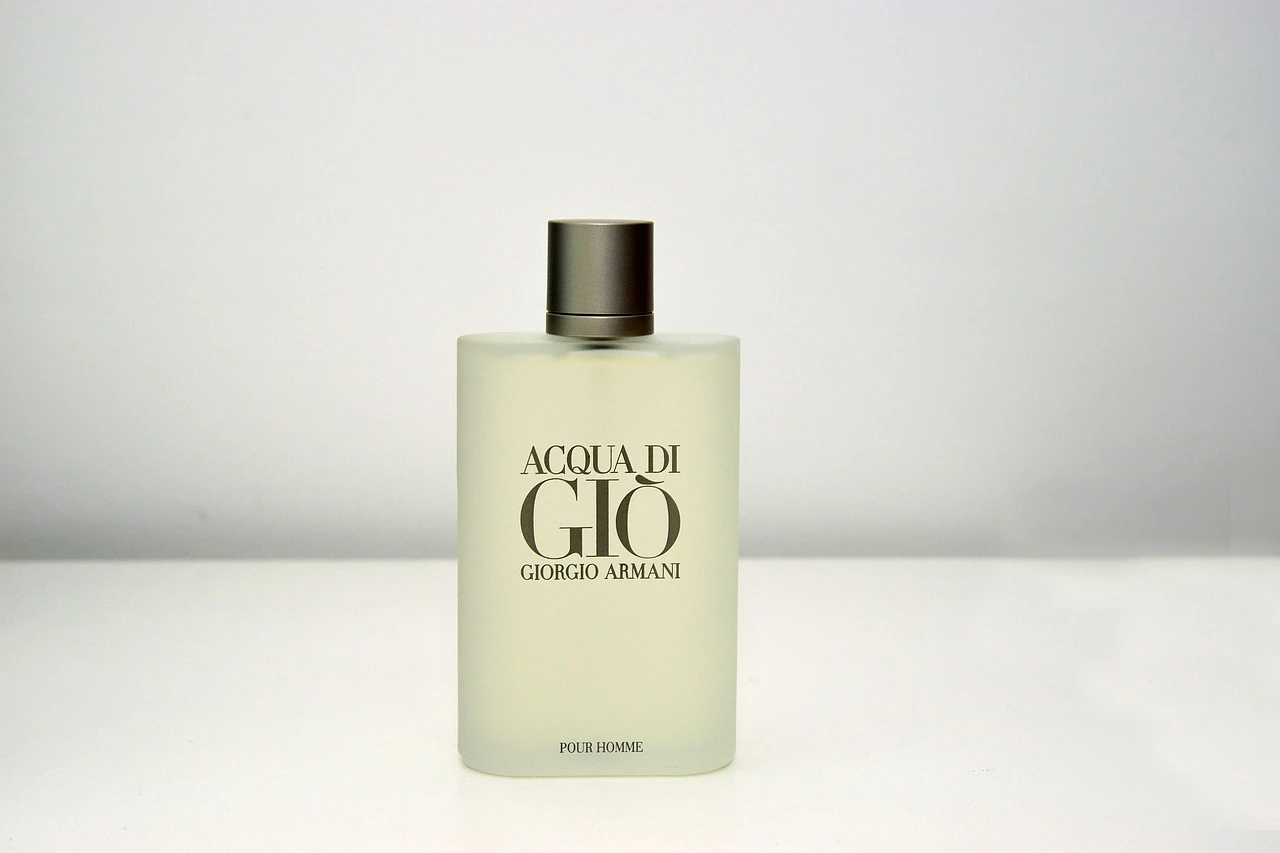 Perfume with a gray background